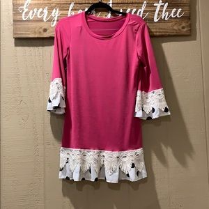 Pink and black and white polka dot shirt